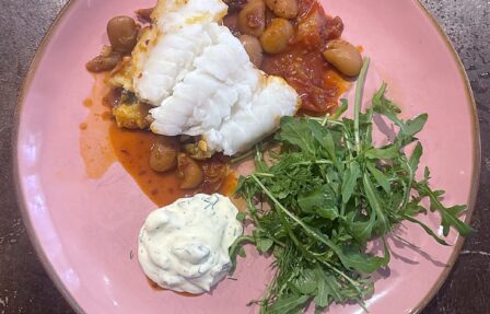 Picture of fish with harissa butterbeans & herb salad